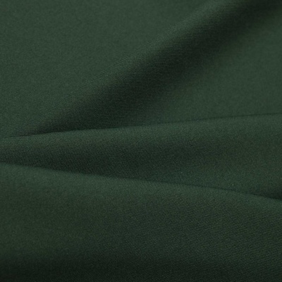 Ткань костюмная 21010 2076, 225 гр/м2, шир.150см, цвет т.зеленый - купить в Междуреченске. Цена 394.71 руб.